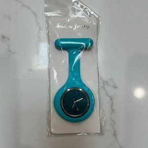 NWT hanging pendant watch, turquoise, can pin to uniform, backpack, etc.